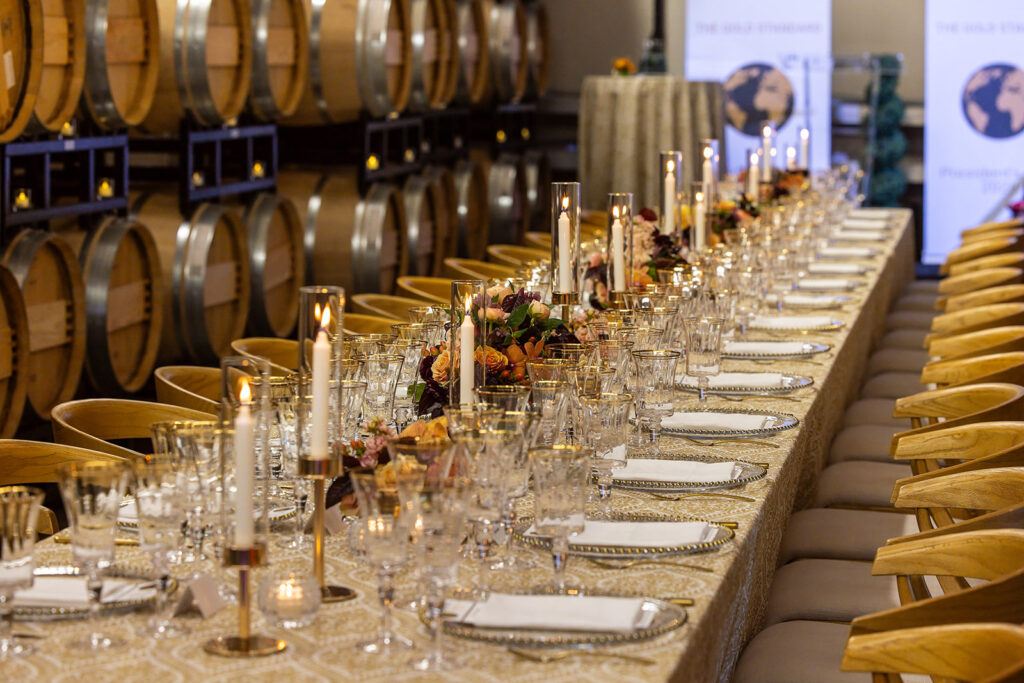 Table for 32 set up in the barrel cellar for sales award presentation.