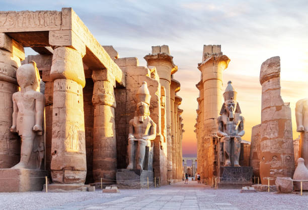 Ancient temple columns at Luxor, Egypt, at sunset