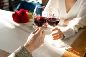 Couple appreciating wine in Napa Valley honeymoon